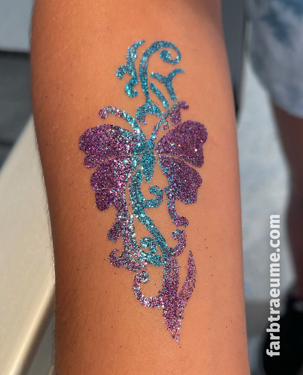 glitzertattoo-grosser-schmetterling Glitzer-Tattoo Großer Schmetterling